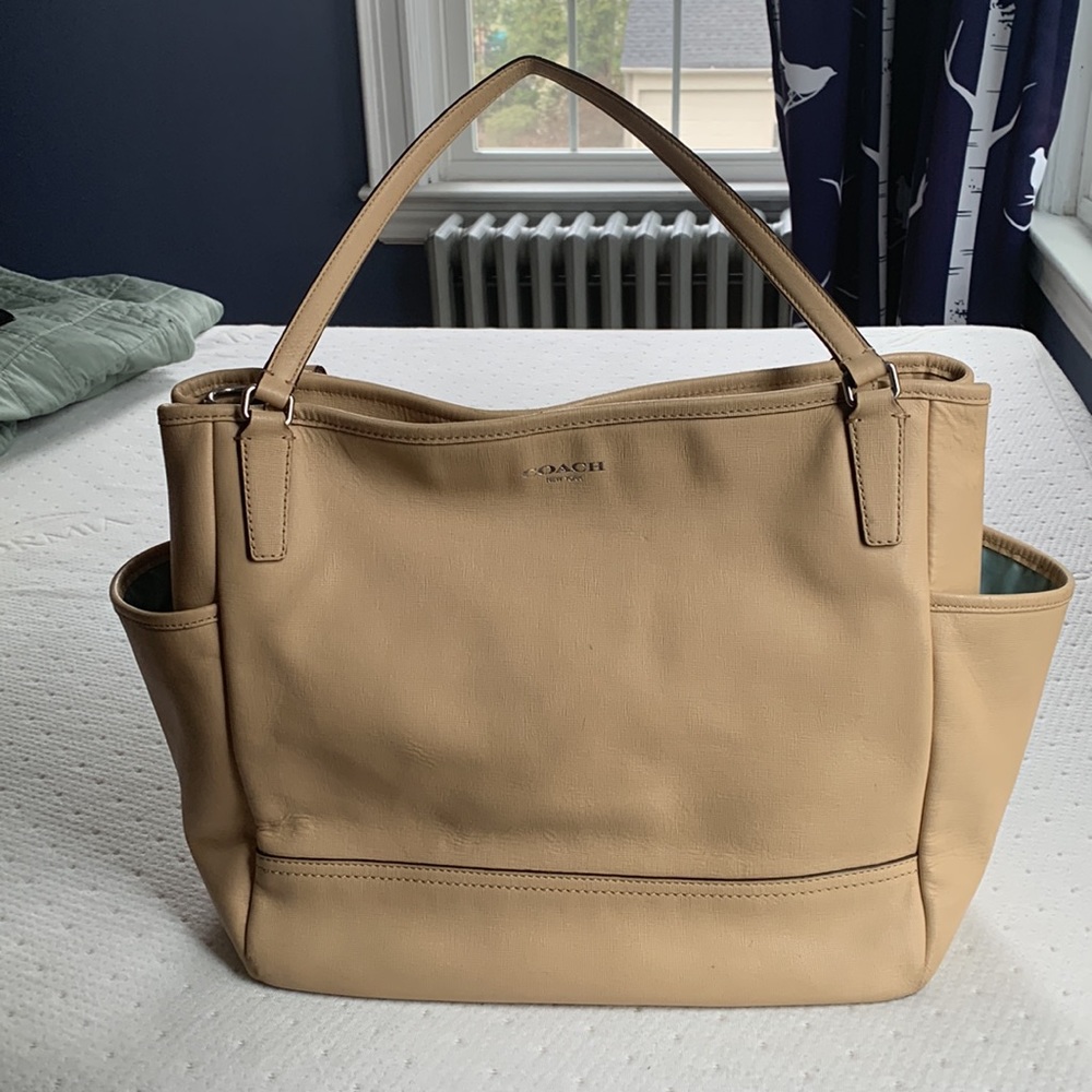Coach tan diaper bag.